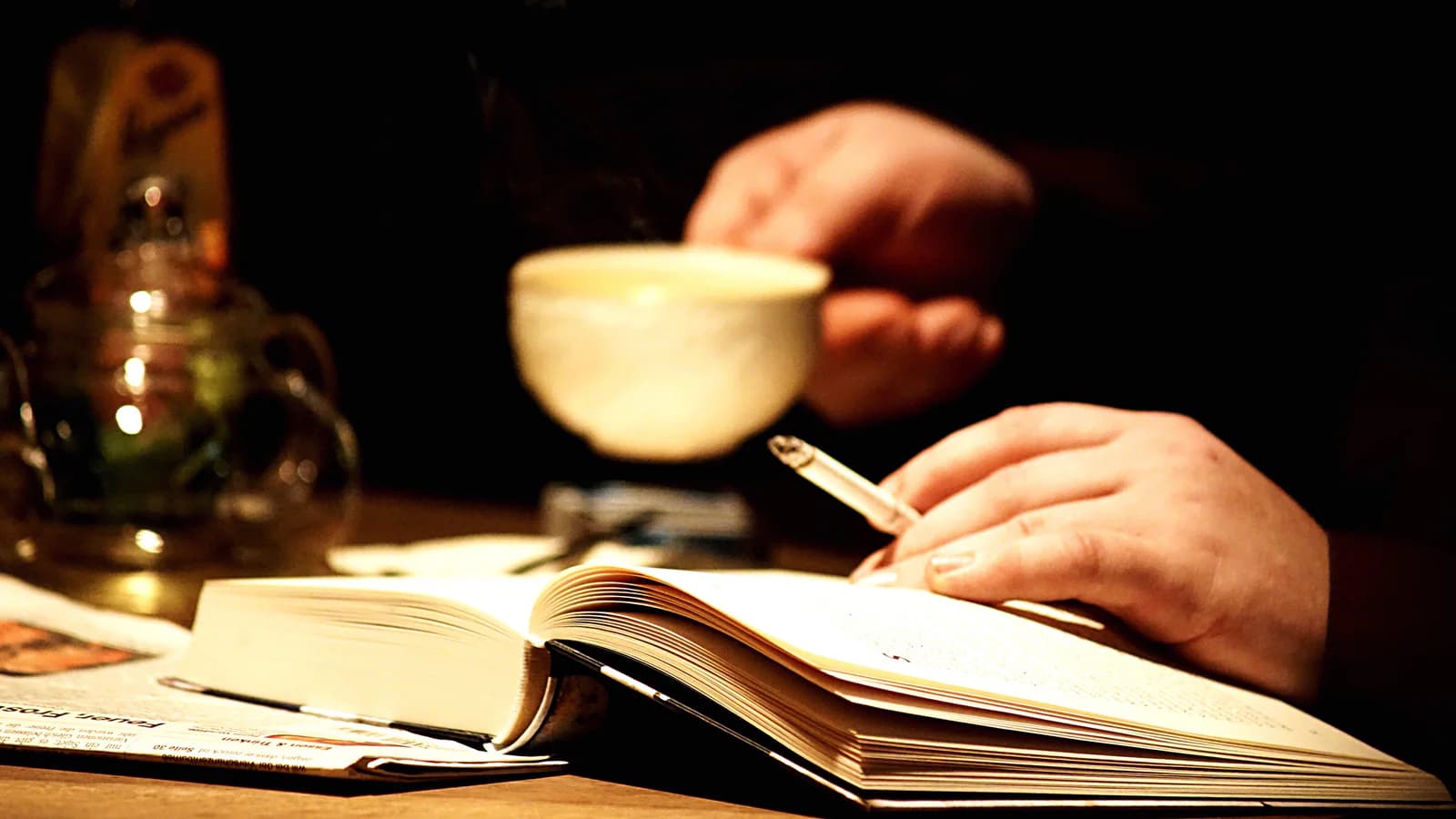 Open book on a wooden desk